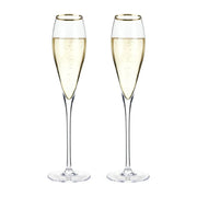 This stunning set of crystal gold rimmed champagne flutes is sure to more than raise a toast. Perfect gift for the Bride & Groom or to celebrate a Golden Wedding Anniversary. Boxed set of two, 8oz champagne flutes. Lead free crystal with gold coloured plating.  Hand wash only.  270mm H