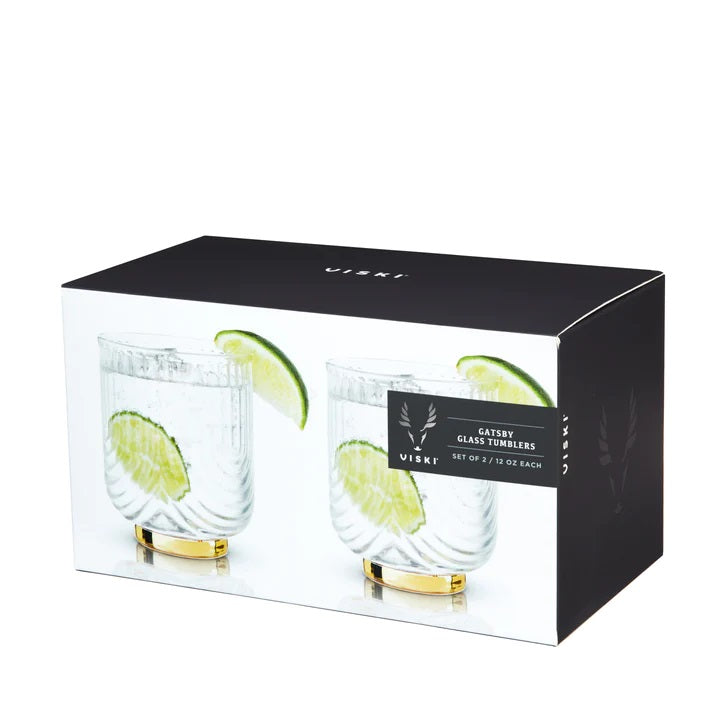 These 1920"s style elegant glasses feature a draping style glass offering a striking silhouette with polished gold plated base. Perfect for whiskey, margarita, negroni and more.  Boxed set of 2 Belmont Gatsby 12 oz Glasses.  High quality glass with gold electroplating.  Handwash only.