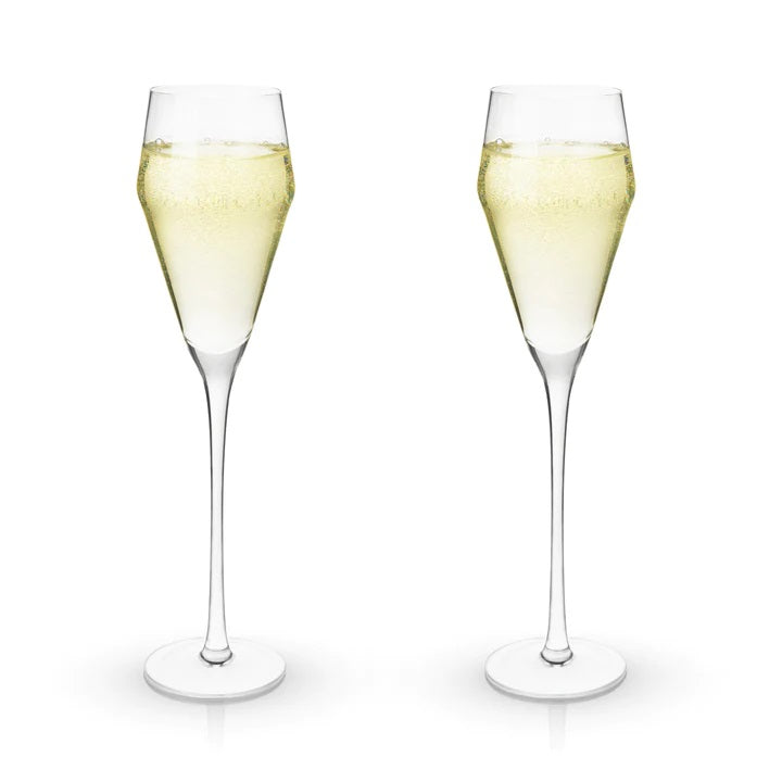 Stunning lead-free Crystal Glasses with tall stems and sleek angles. A narrow, tapered, modern design to preserve carbonation and complement the taste of prosecco.  Boxed set of two 8 oz lead-free crystal glasses.  270mm H