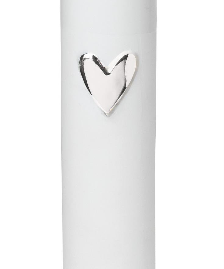 White porcelain vase by Radar with a relief heart finished with in silver.  Size: 40mm diameter x 170mm high